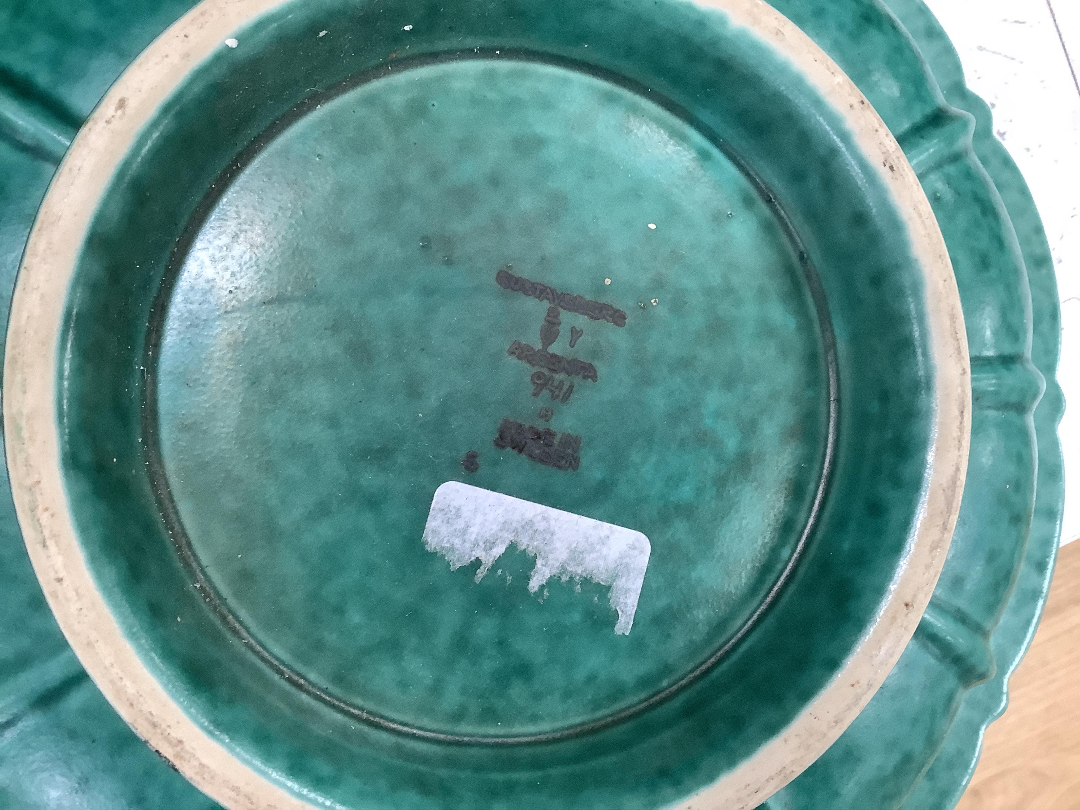 A Gustavsberg Argenta ware footed dish, a signed maiolica charger and a studio pottery crackle glazed bowl, largest 35cm